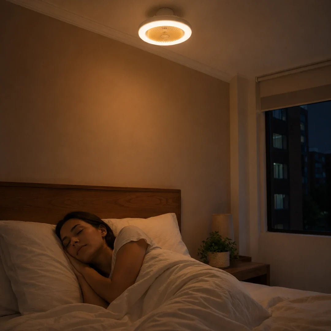 Mujer durmiendo de noche con la luz cálida y la brisa suave de la Frescalia